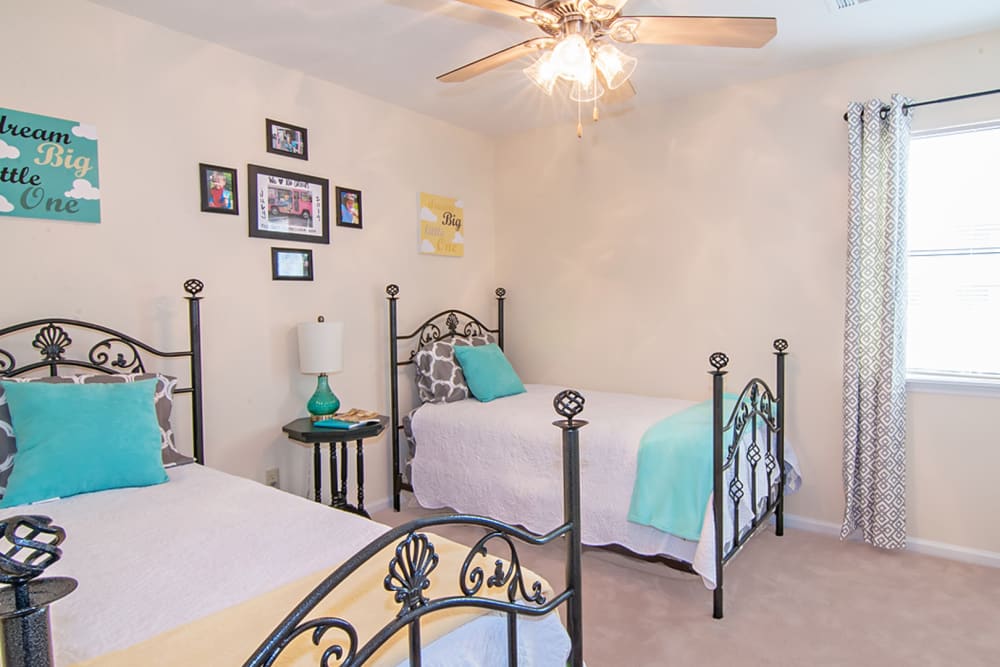 Children's room with two twin beds at Greenleaf Apartments in Phenix City, Alabama