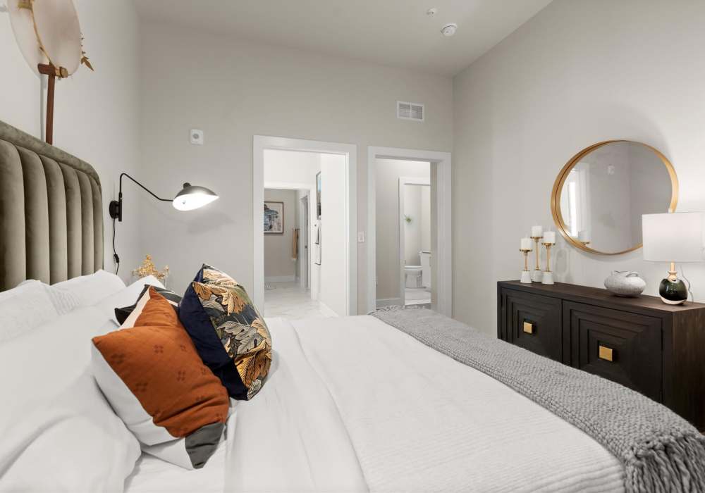A cozy bed at EVOQ East Cobb in Marietta, Georgia