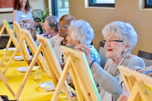 Residents painting at Royal Palm Senior Living in Port Charlotte Florida