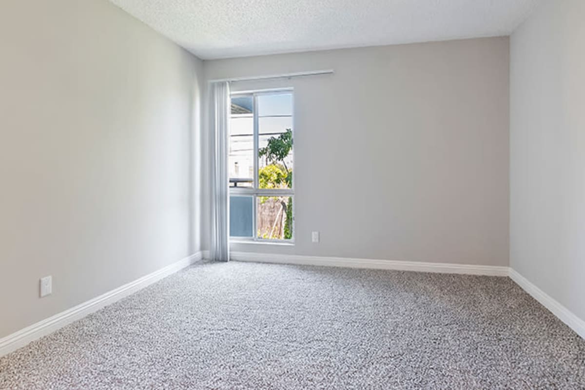 Bedroom with nice window at Westside Terrace, Los Angeles, California