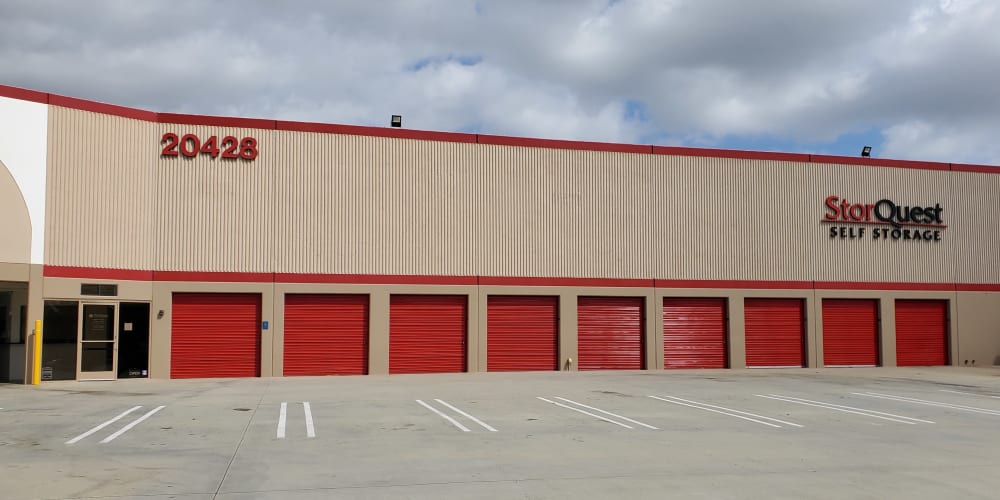 Exterior storage units with red doors at StorQuest Self Storage in Torrance, California