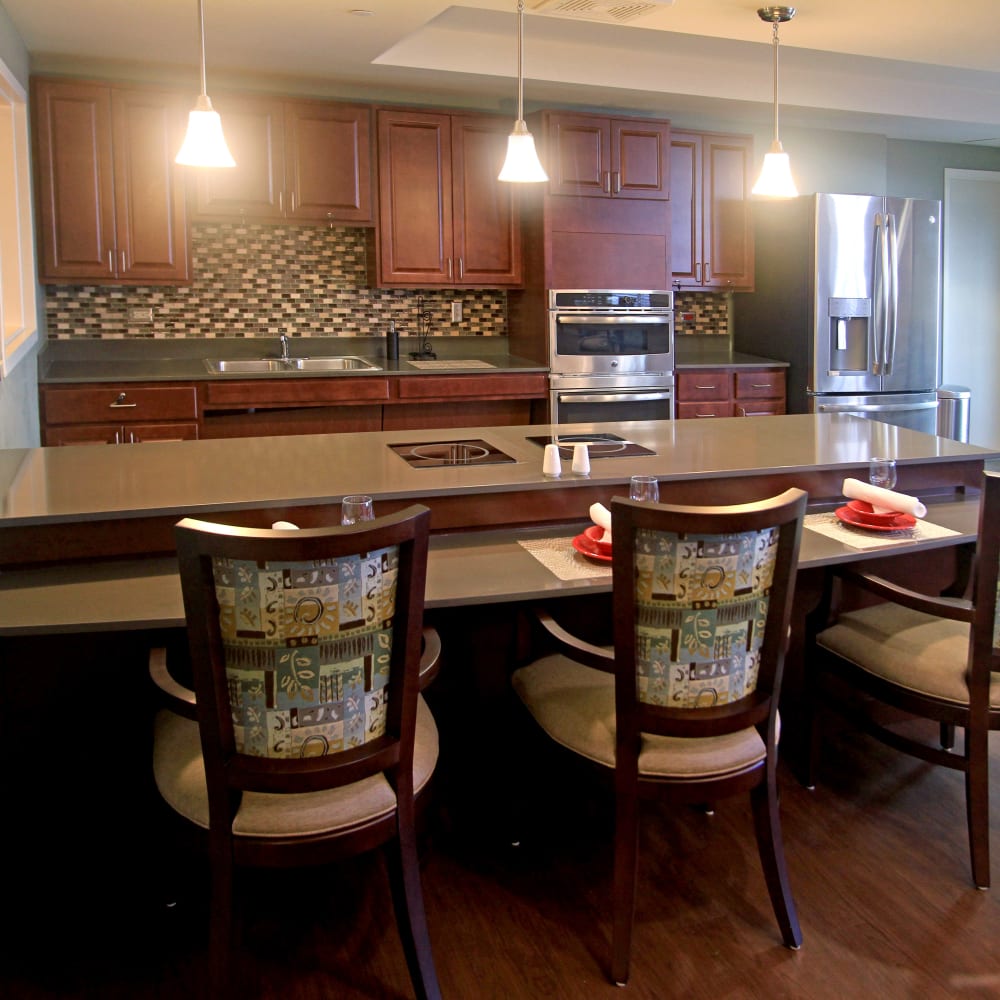 Resident kitchen and dining table at Anthology of Grayslake in Grayslake, Illinois