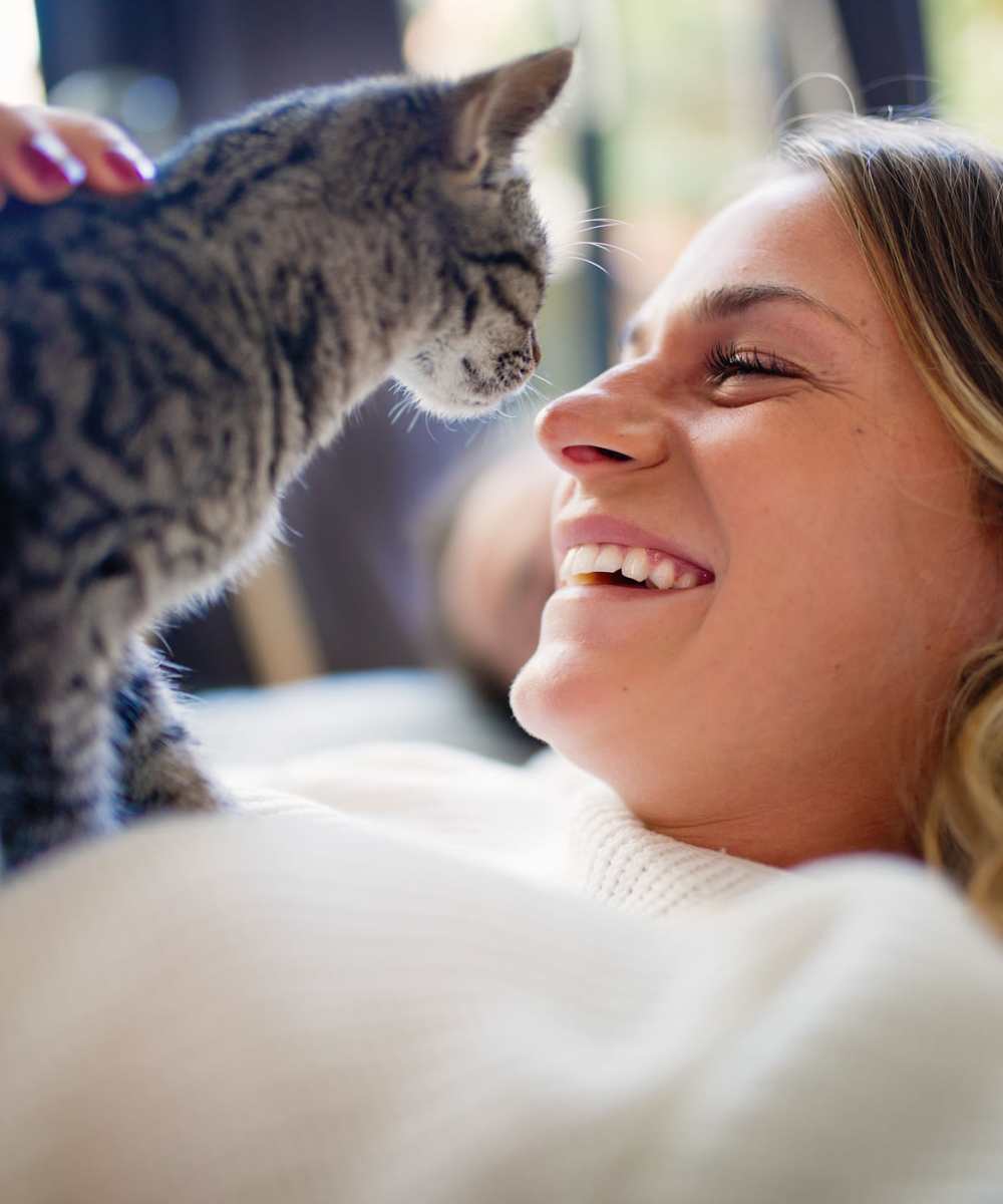 Gal holding a cat at Stonecrest Apartments in Spokane, Washington