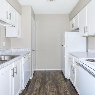 Apartment kitchen at CrescentWood Apartments in Clute, Texas