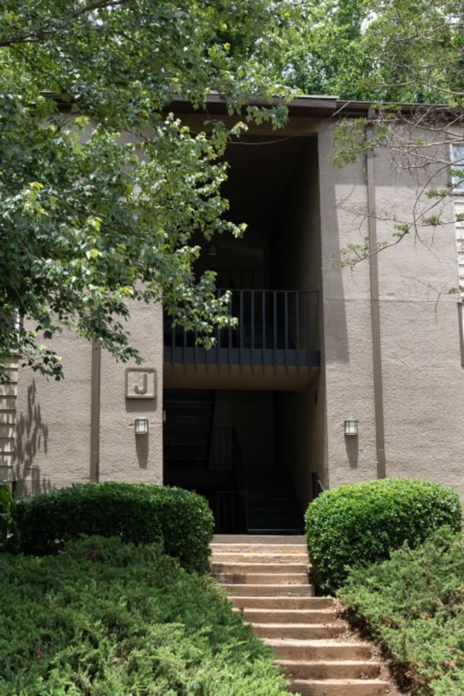 Landscaping around and apartment building at Foxwood Apartments in Doraville, Georgia