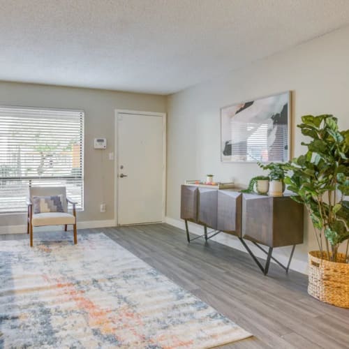 Wood-style flooring in an apartment living room at Ardella on 67th in Glendale, Arizona