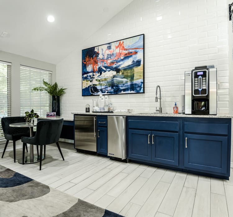 Clubhouse with amenities poolside at The Regent in Dallas, Texas