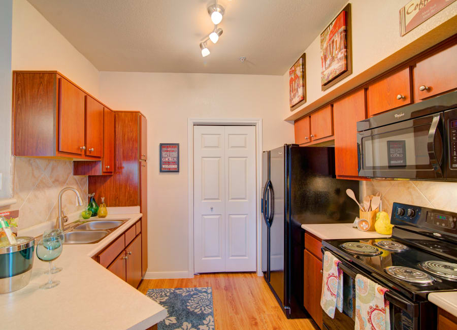 Fully equipped kitchen at Park Hudson Place in Bryan, Texas