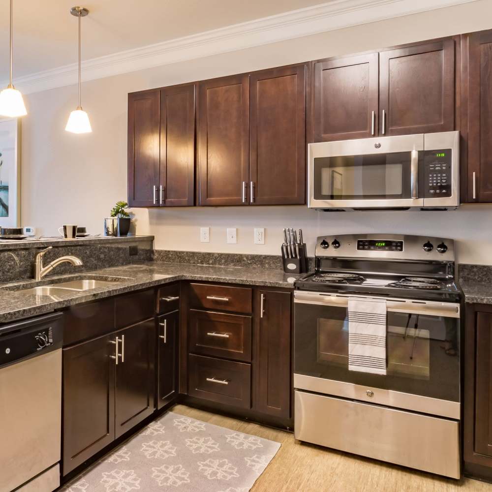 A modern kitchen at The Apartments At Kelton Station in Williamsburg, Virginia