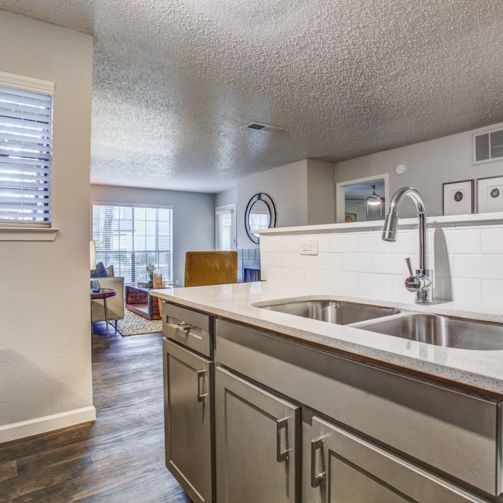 Living space featuring wood-style flooring at The Reese at Eastchase in Fort Worth, Texas