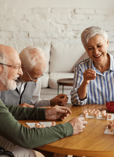 Residents playing cards in the clubhouse at Leisure Living in Evansville, Indiana