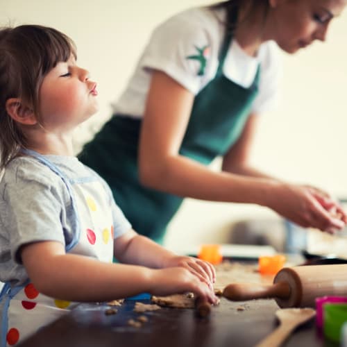 Mother and daughter cooking at The Station in Houston, Texas