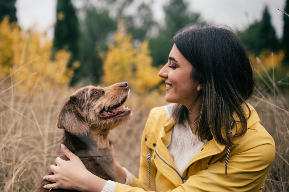 Resident playing with her dog near The Gabriel in Leander, Texas
