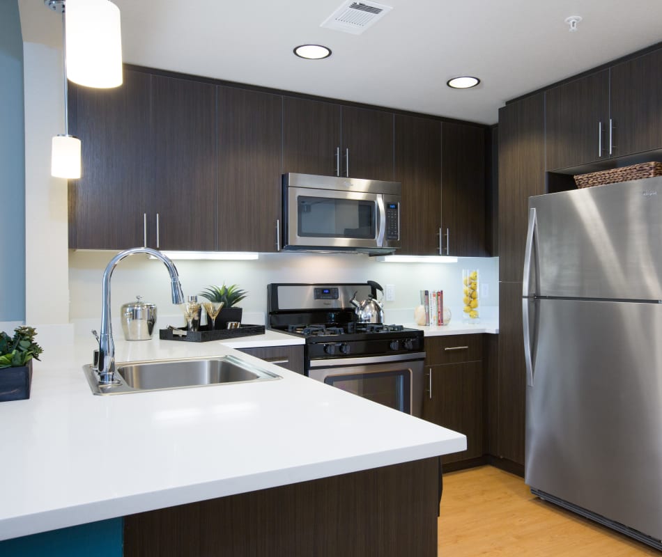 Spacious kitchen with large counter tops in a model home at Sofi Riverview Park in San Jose, California