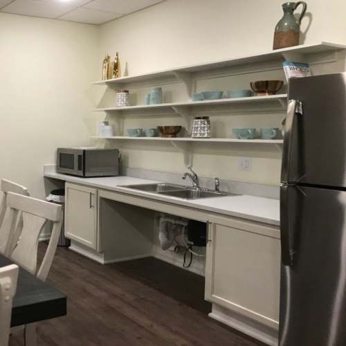 A kicthen with stainless-steel appliances at Cavalier Greene in Corunna, Michigan
