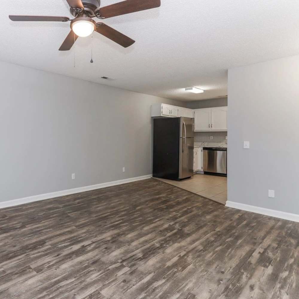 Living room with a view of kitchen at The Oaks At Northshore in Chattanooga, Tennessee