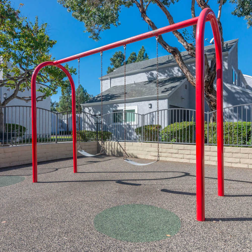Swings in the playground for kids at Alicia Park in Laguna Niguel, California