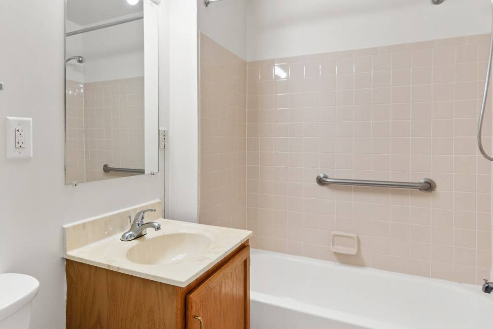Bathroom with bathtub at Randolph Village Senior Apartments in Silver Spring Maryland