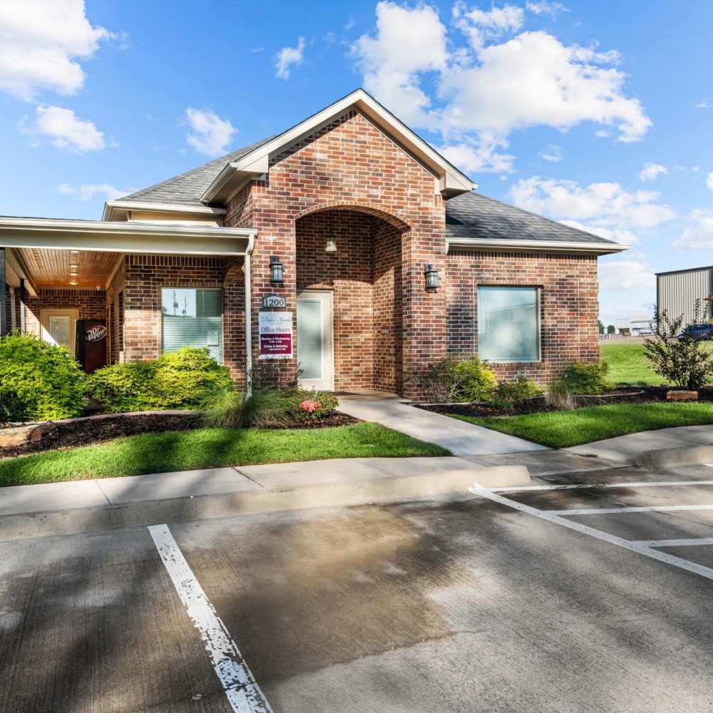 Entrance view of apartment at The Arbors of Mineola in Mineola. TX