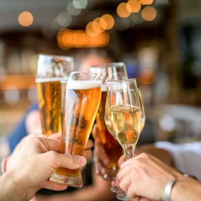 Friends having drinks at a restaurant nearby UTE Creek Apartments in Longmont, Colorado