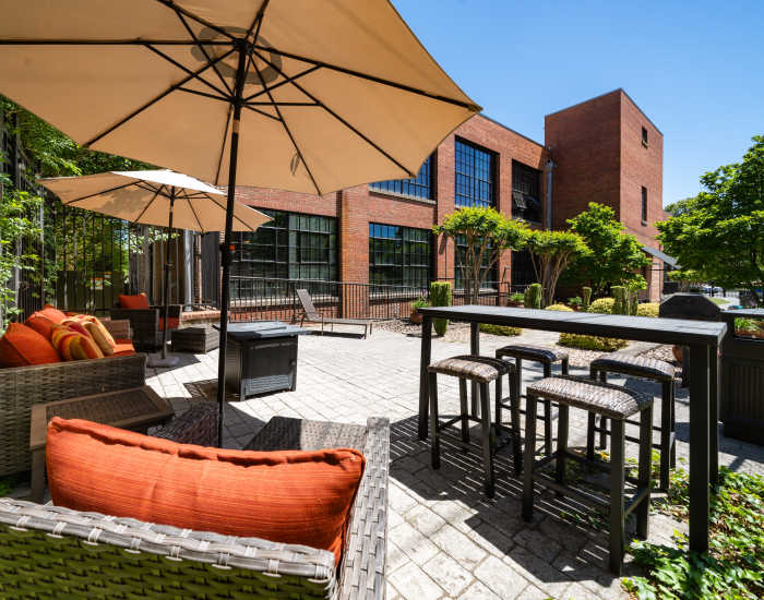 Courtyard with outdoor seating at The Cotton Mill Lofts in Roanoke, Virginia