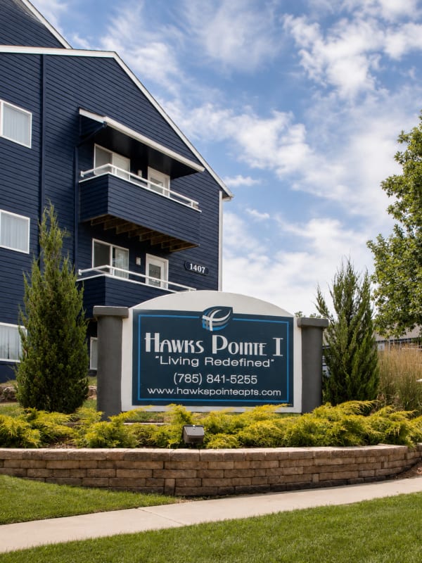 Student housing community entrance monument sign at Hawks Pointe in Lawrence, Kansas