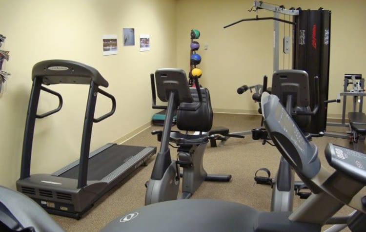 Stay healthy in our fitness center at Racquet Club Apartments