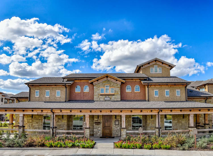 View of our community from across the street on a beautiful day at Overlook Ranch in Fort Worth, Texas