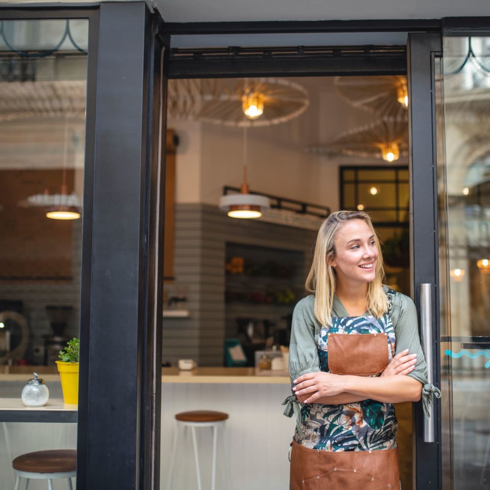 Woman standing outside coffeeshop near Windsor Ridge in Sacramento, California