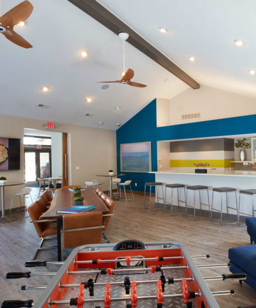 Foosball table and community kitchen at Lakeside Terraces in Sterling Heights, Michigan