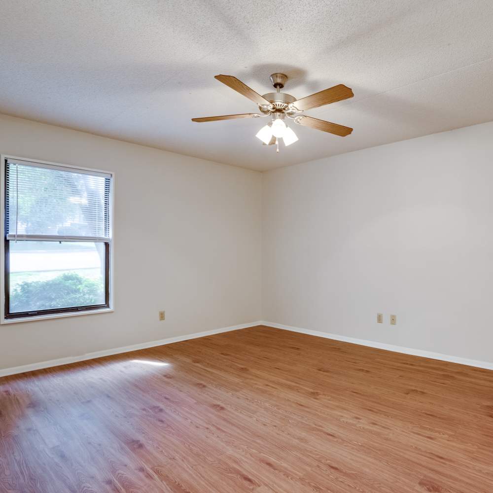 Unfurnished bedroom with wooden flooring at Germantown Gardens in East Ridge, Tennessee