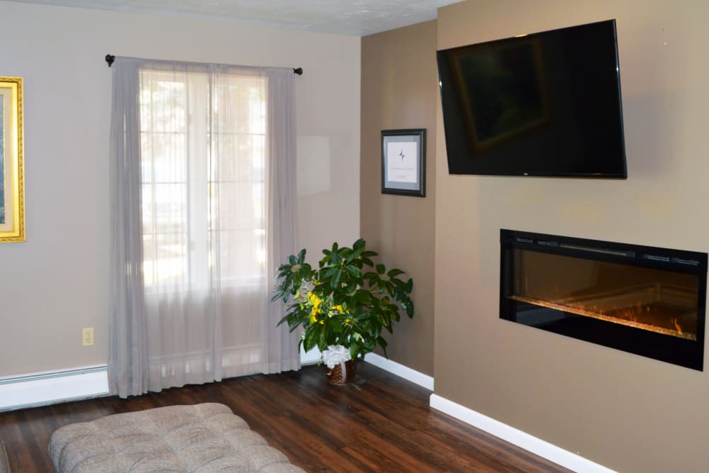 A lounge complete with television set at Wyndemere Memory Care in Green Bay, Wisconsin. 