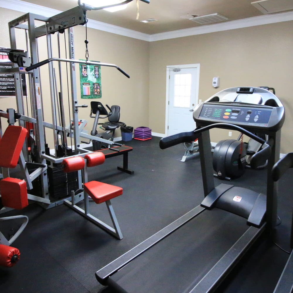 Treadmills and exercise equipment in the fitness center at Oaks Estates of Coppell in Coppell, Texas