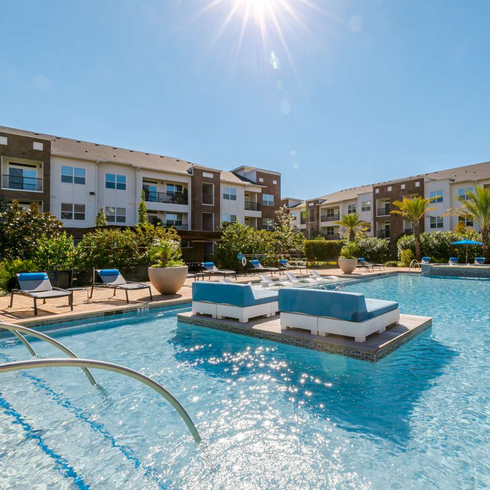 Sparkling pool with seating at NOVU New Forest in Houston, Texas