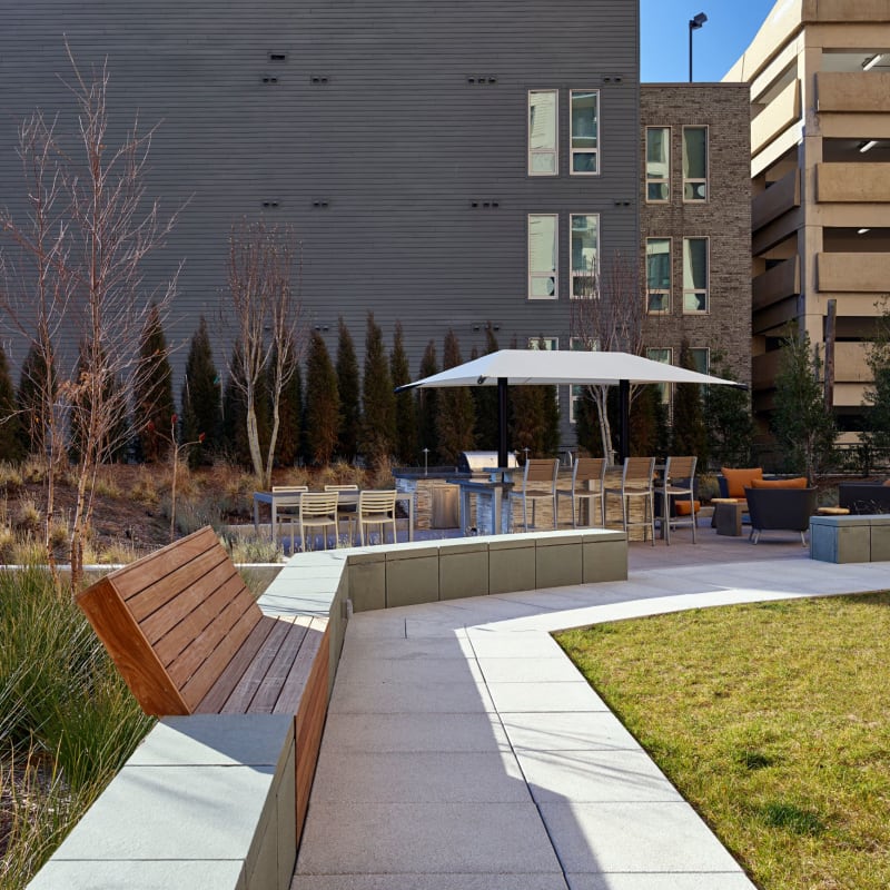 Clubhouse patio with a BBQ area at Solaire 8250 Georgia in Silver Spring, Maryland