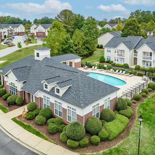 Aerial view of apartment homes and landscaped grounds at Brittany Place Hendersonville in Henderson, North Carolina