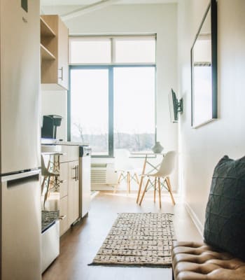 Model kitchen with modern appliances at University Lofts at Greensborough Village, Jonesboro, Arkansas