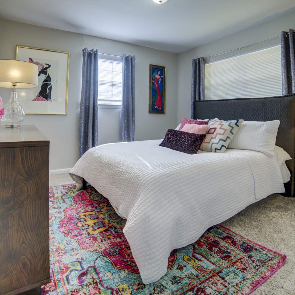 Bedroom with carpet flooring at Avonlea Westside in Atlanta, Georgia