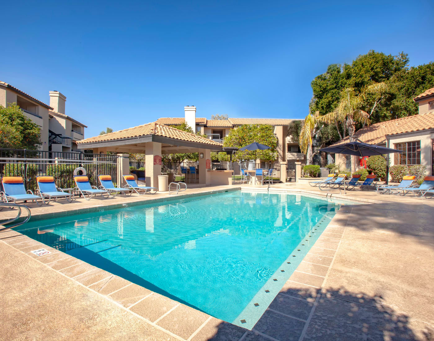 Beautiful swimming pool area at Elliot's Crossing Apartment Homes