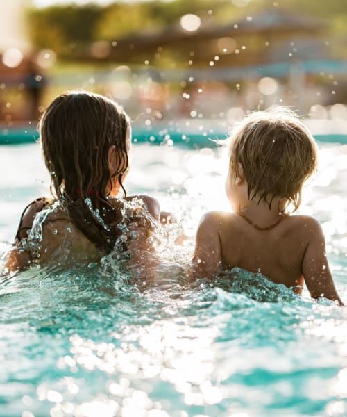 Kids playing in pool at Ascent at Papago Park, Phoenix, Arizona 