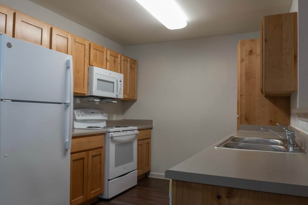 Kitchen with energy-efficient appliances at Redland Creek in Lawrenceville, Georgia