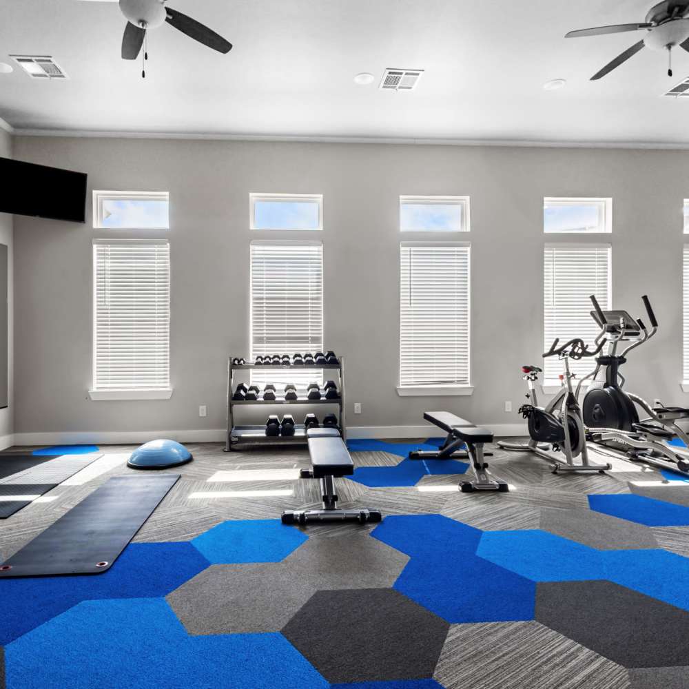 Fitness center with various equipments at Deer Park in Athens, Texas