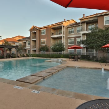 The sparkling community swimming pool at Cypress Creek at Fayridge in Houston, Texas