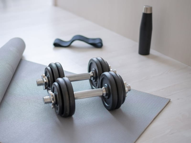 Resident working out in fitness center at Apartments at Sanatoga Greene, Sanatoga, Pennsylvania