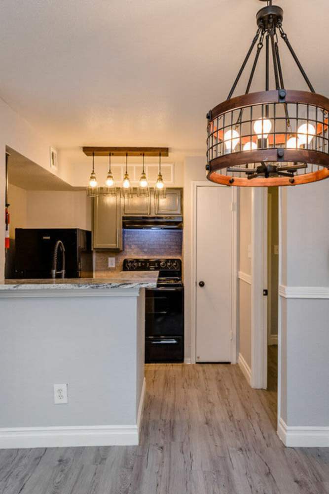 Kitchen with appliances at Pine Lake Village in Houston, Texas
