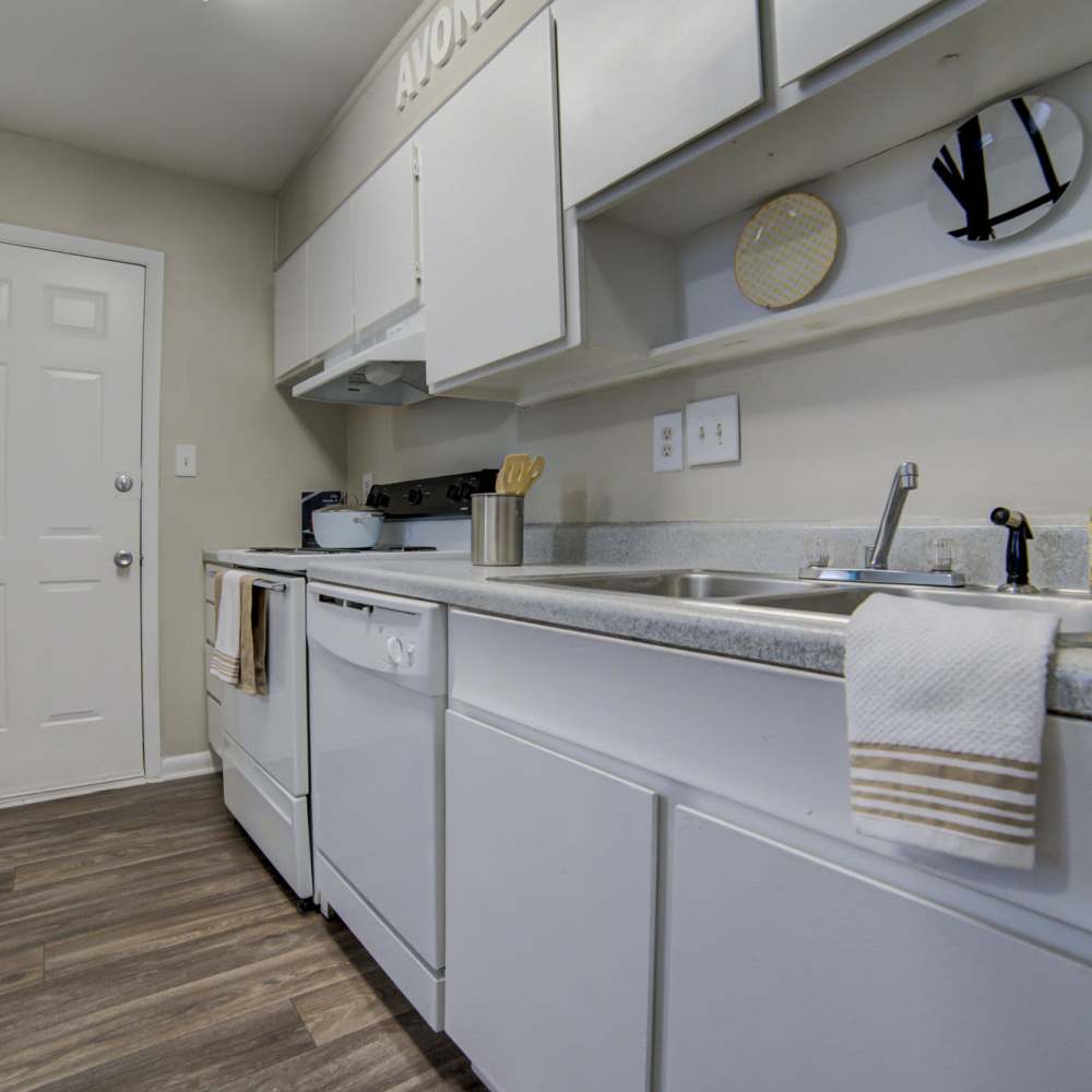 Kitchen with white appilances at Avonlea Westside in Atlanta, Georgia
