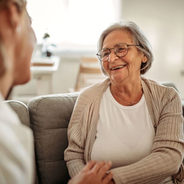 Resident being assisted  at Pacifica Senior Living Spring Valley in Las Vegas, Nevada