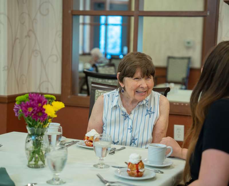 Residents being served in the dining hall at York Gardens in Edina, Minnesota