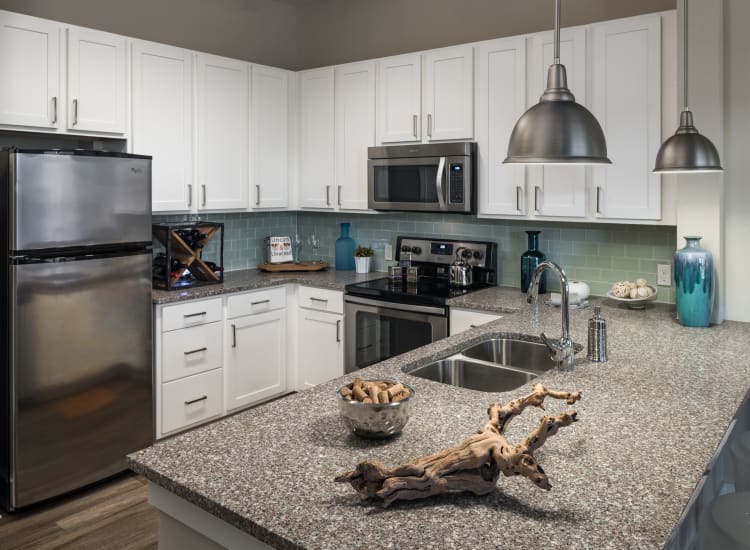 Large modern kitchen at BluWater Apartments in Jacksonville Beach, Florida