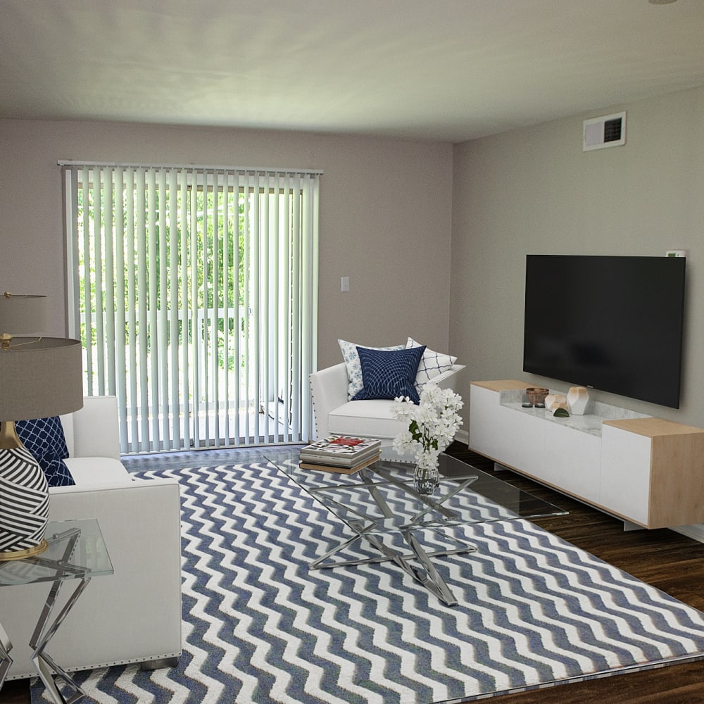 An apartment living room at Georgetowne Woods in Gastonia, North Carolina